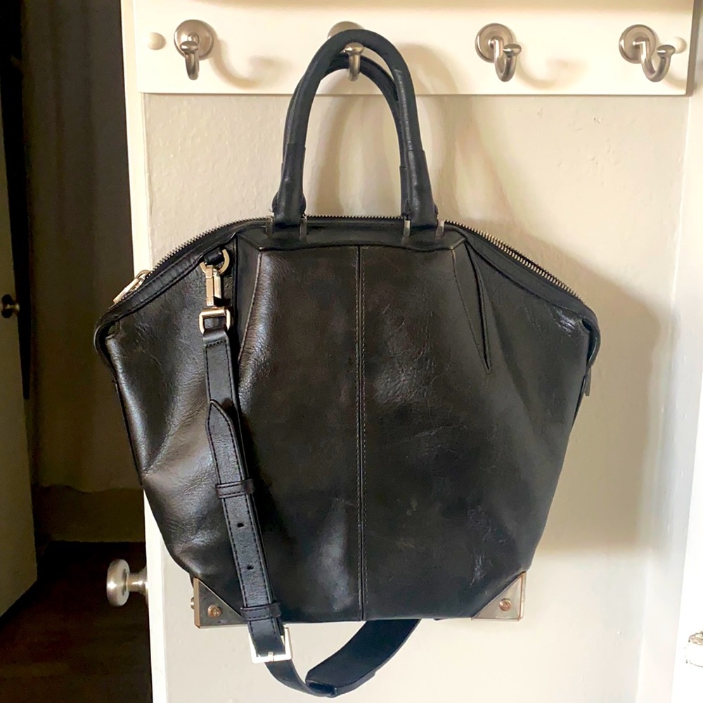 Beautiful handbag by Alexander Wang with distressed leather and chrome hardware.